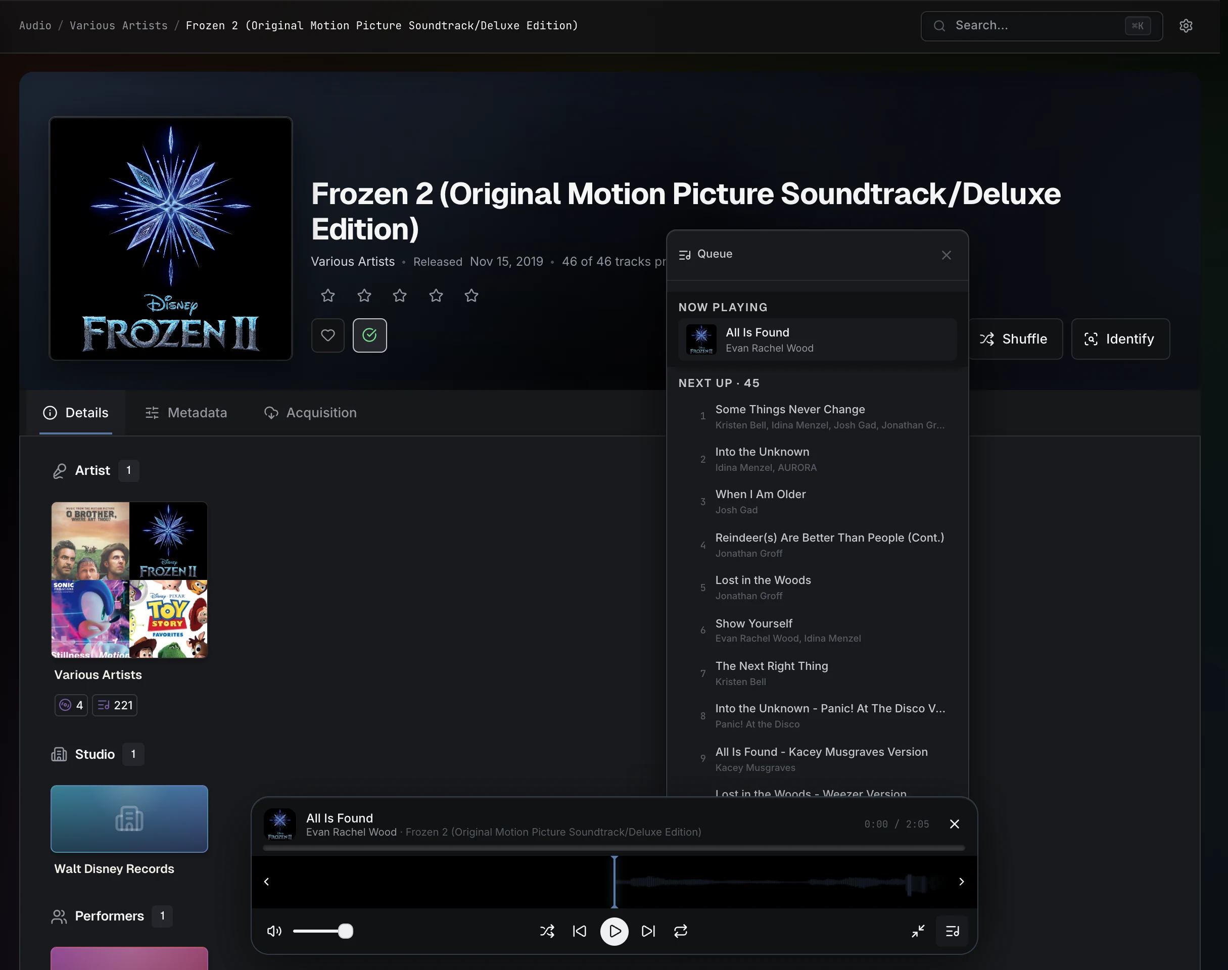 The web music player and Up Next queue over an album detail page.